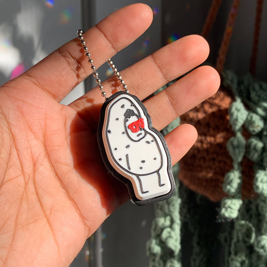 By Akki Akkitato Clicker Keychain
